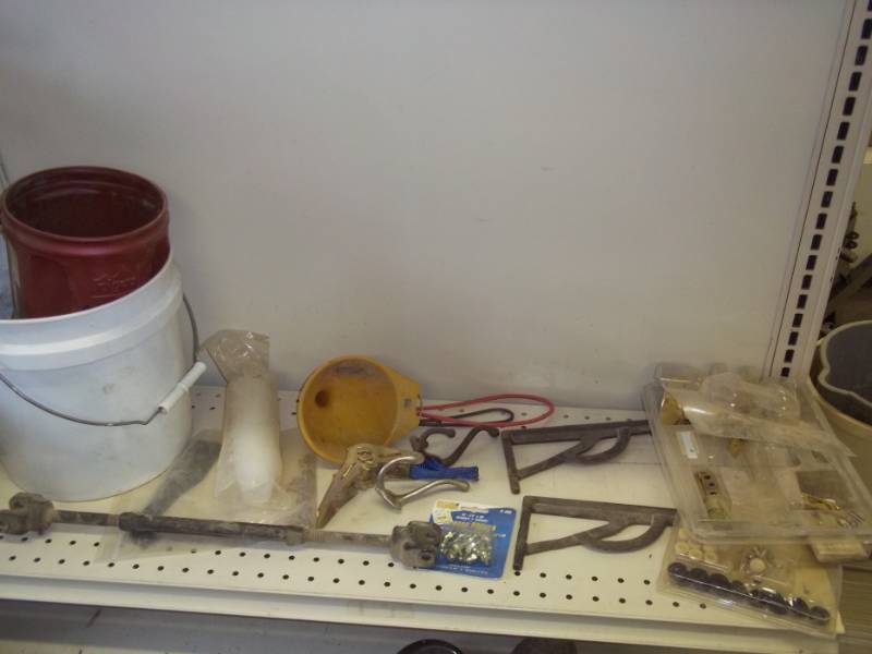 lot 279 image: Assorted products, new grease fittings, door latch, coat hooks