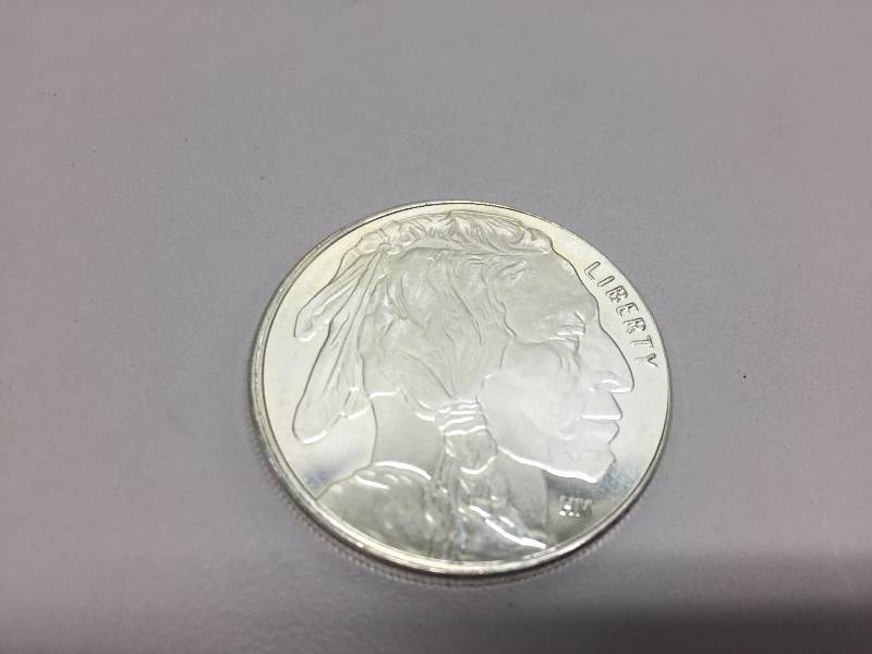 lot 42 image: NATIVE AMERICAN .999 FINE SILVER ROUNDS