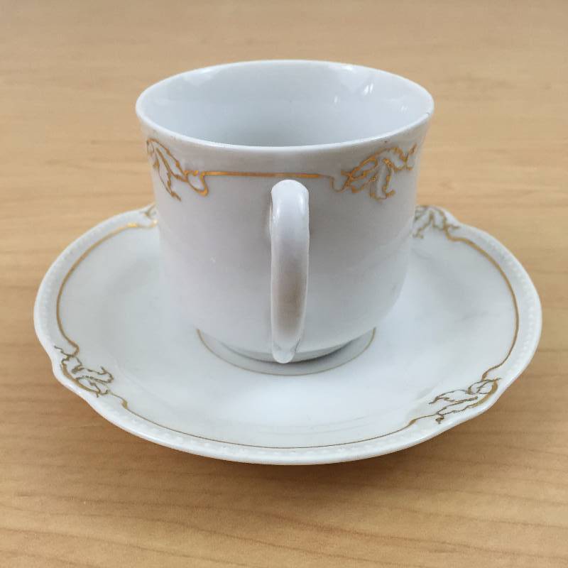 lot 60 image: Antique Gold & White Numbered Brother Cup & Saucer Made in Germany