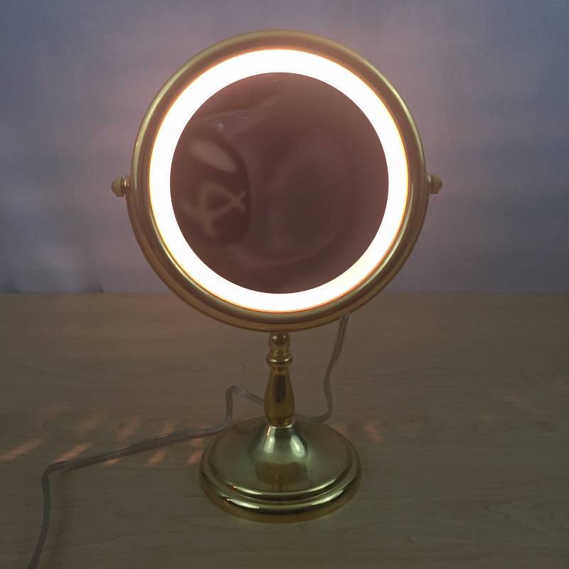 lot 34 image: Mid Century Modern Brassy Gold Heavy Vintage WORKING Light Up Make Up Vanity Mirror Boudoir Hollywood Regency - Minor Wear For Age