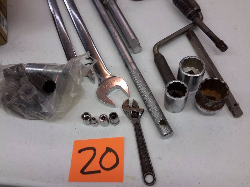 2, 1 18 in, 1 14in JC Penny Combinations wrenches.  34 in Driver with 8 in extension, Misc. 34 Sockets and other misc. items