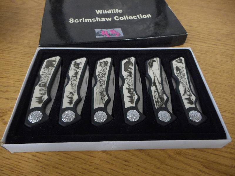 lot 45 image: WILDLIFE SCRIMSHAW COLLECTION 6 POCKET KNIFE COLLECTION