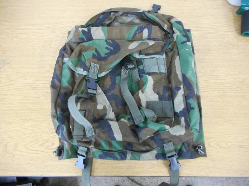 lot 79 image: CAMOUFLAGE BACKPACK