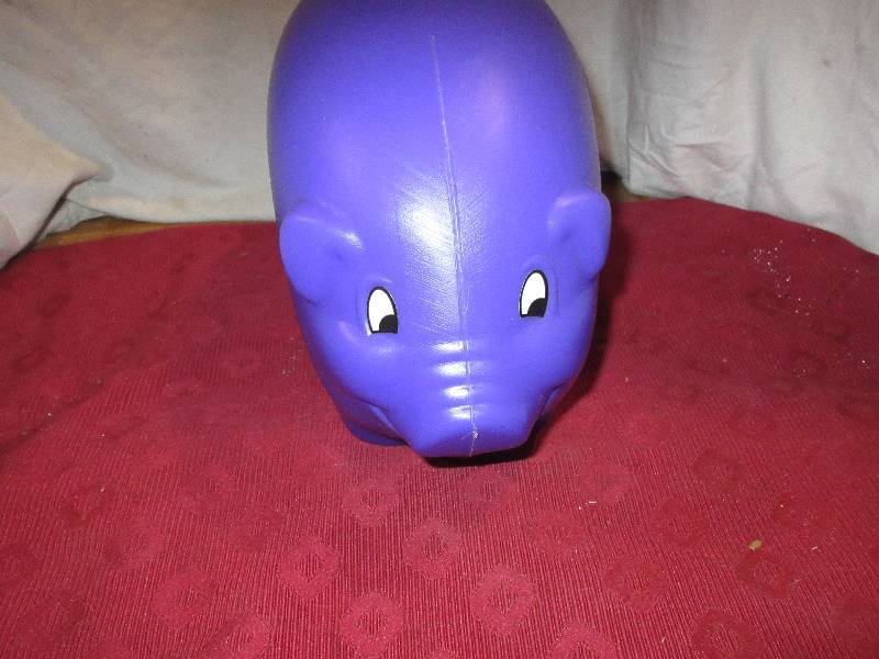 PURPLE PLASTIC PIGGY BANK
