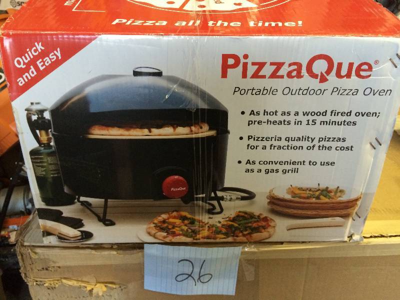 lot 26 image: Pizzacraft PizzaQue Portable Propane Gas Outdoor Pizza Oven Model # PC6500 like New conditions top ceramic plate are broken