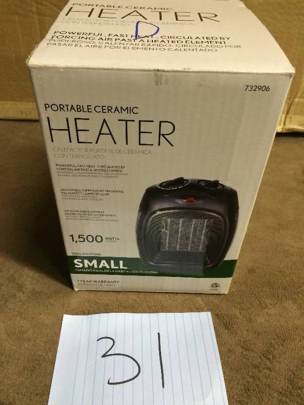 lot 31 image: 1,500-Watt Convection Electric Portable Heater and Fan like new  working conditions