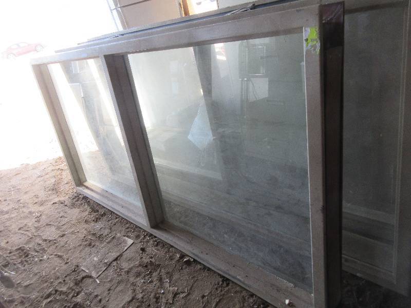 lot 42 image: SINGLE PANE SIDE BY SIDE WINDOWS