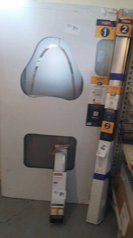 lot 84 image: Delta Sliding Glass tub door and accessories