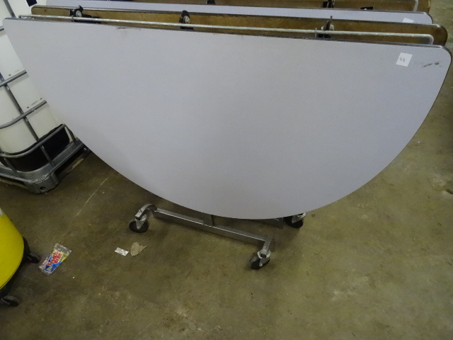 lot 44 image: Fold Up Round Table on Wheels 60