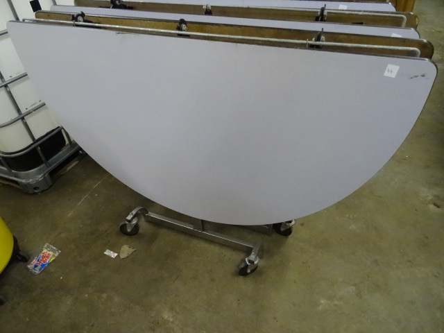 lot 45 image: Fold Up Round Table on Wheels 60
