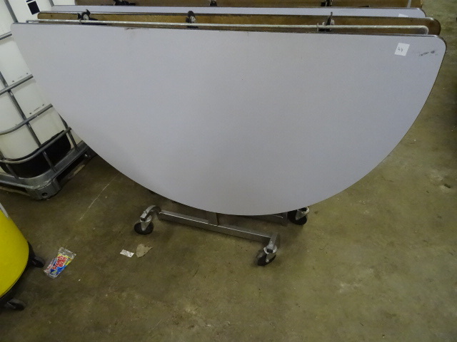 lot 47 image: Fold Up Round Table on Wheels 60