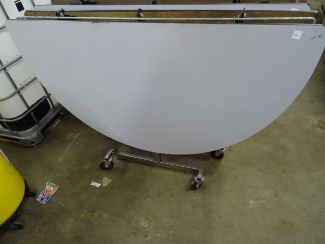 lot 51 image: Fold Up Round Table on Wheels 60