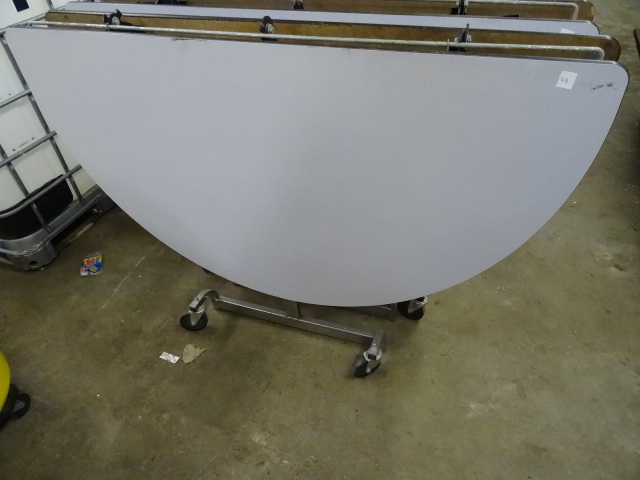 lot 52 image: Fold Up Round Table on Wheels 60