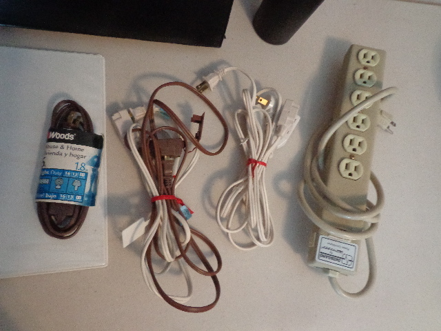 lot 82 image: Binders,Extension Cords & More