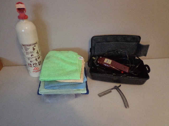 lot 84 image: Fire Extinguisher, Oster Clippers & Micro Fiber Cloths