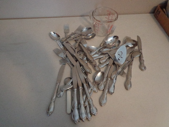 lot 93 image: Measuring Cup & Flatware