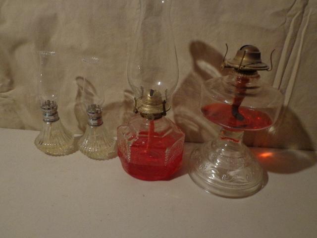 lot 145 image: 4 Glass Oil Lamps