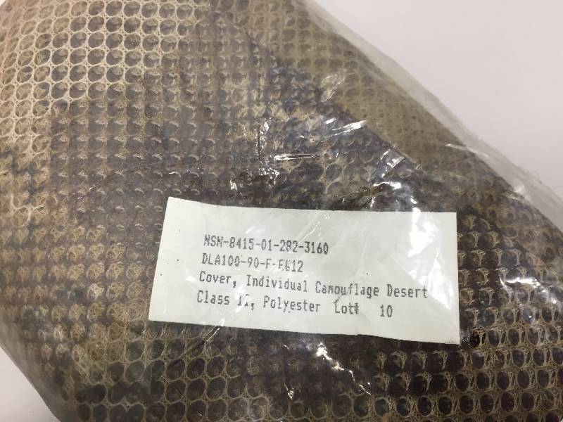lot 4 image: CAMOUFLAGE DESERT COVER (2)  INSECT PROTECTION NET (1)