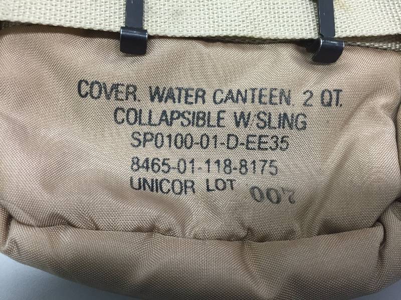 lot 11 image: MILITARY BELT WITH CANTEEN COVER