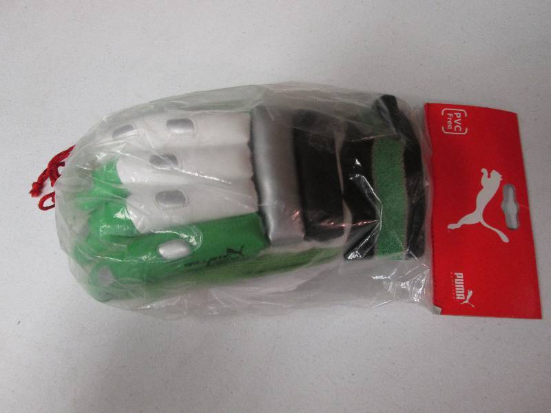 lot 90 image: Puma Cricket Batting Gloves size se...