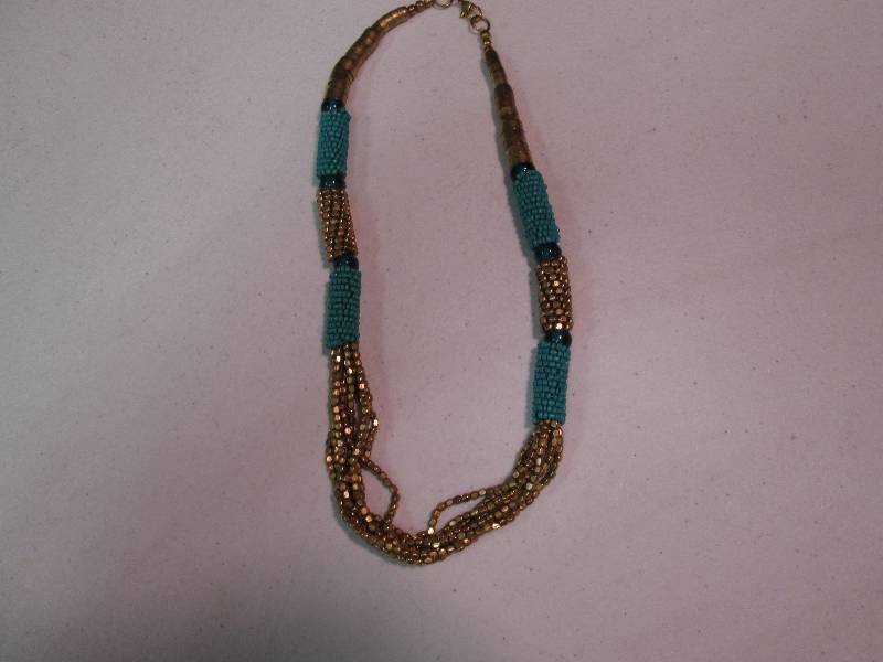 lot 99 image: Gold Turquoise necklace...