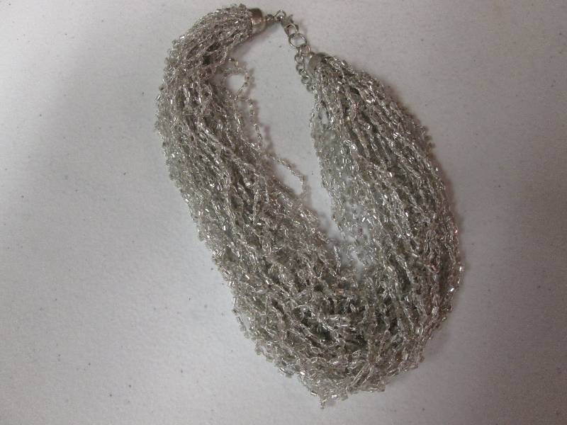 lot 112 image: Silver beaded necklace...