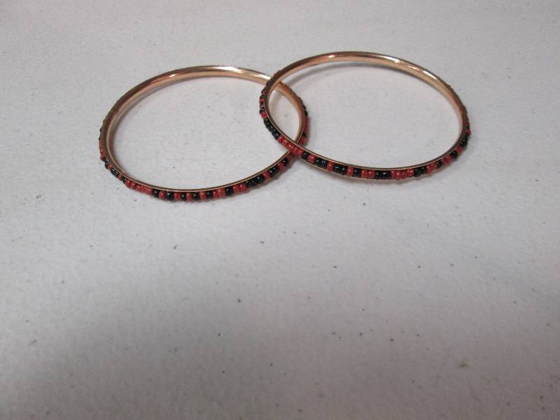 lot 115 image: Set of 2 beaded bangle bracelets...