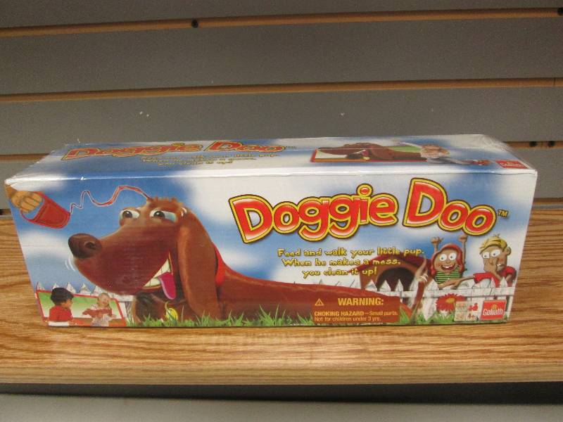 lot 119 image: Doggie Doo game Retail $24.95...