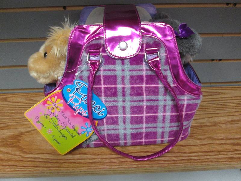 lot 132 image: Pucci Pups plaid bag with plush coc...