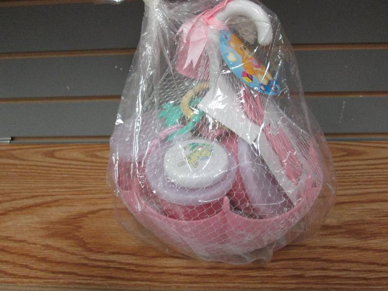 lot 157 image: Pink baby gift in umbrella...