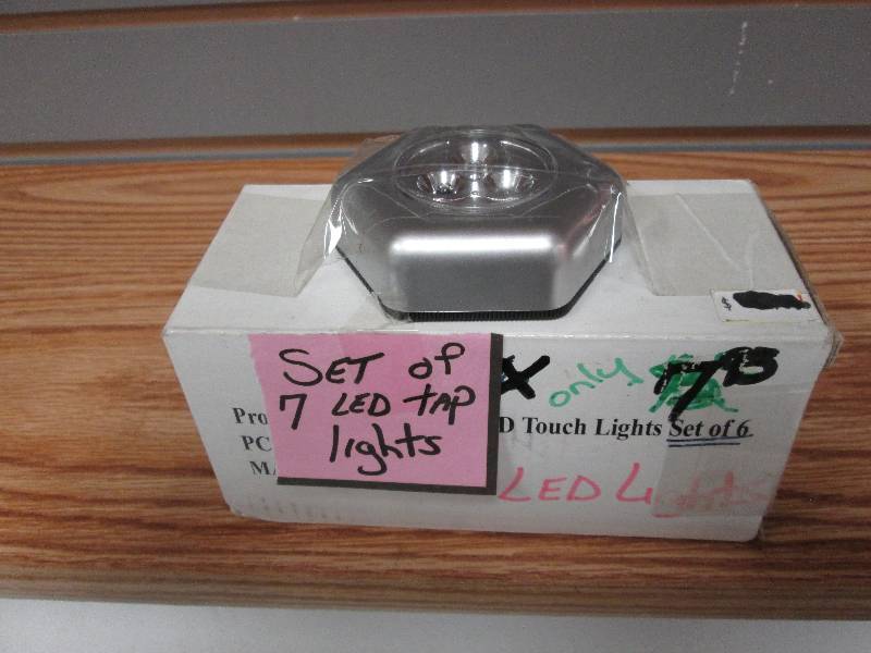 lot 229 image: Set of 7 LED tap lights...