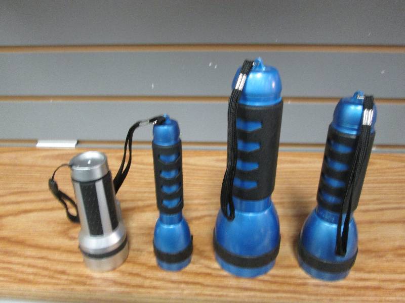 lot 239 image: Lot of 4 assorted size LED flashlig...