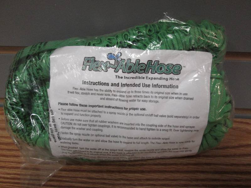 lot 269 image: Green Flex-Able Hose...