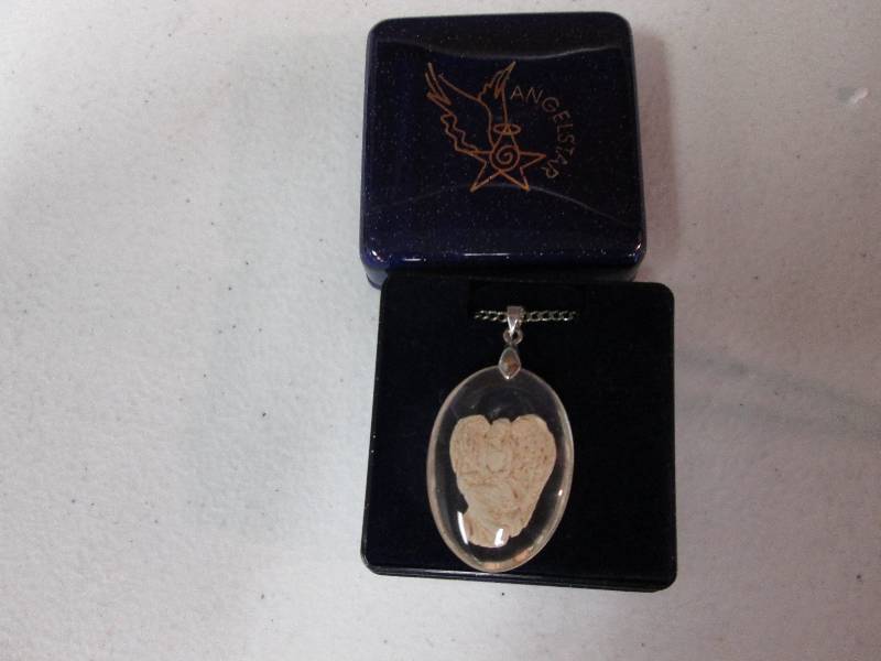 lot 10 image: Angel Star angel pendant...