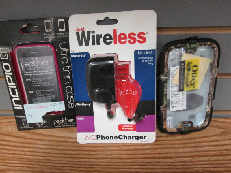 lot 21 image: Assorted phone cases and AC Charger...