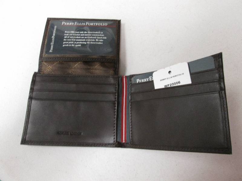 lot 28 image: Perry Ellis Brown bi-fold leather w...