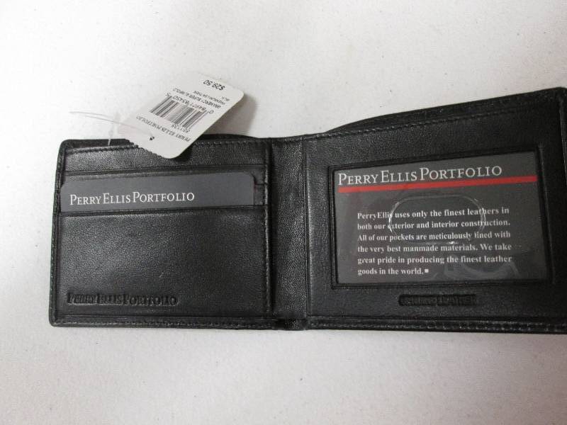 lot 30 image: Perry Ellis Black bi-fold leather w...