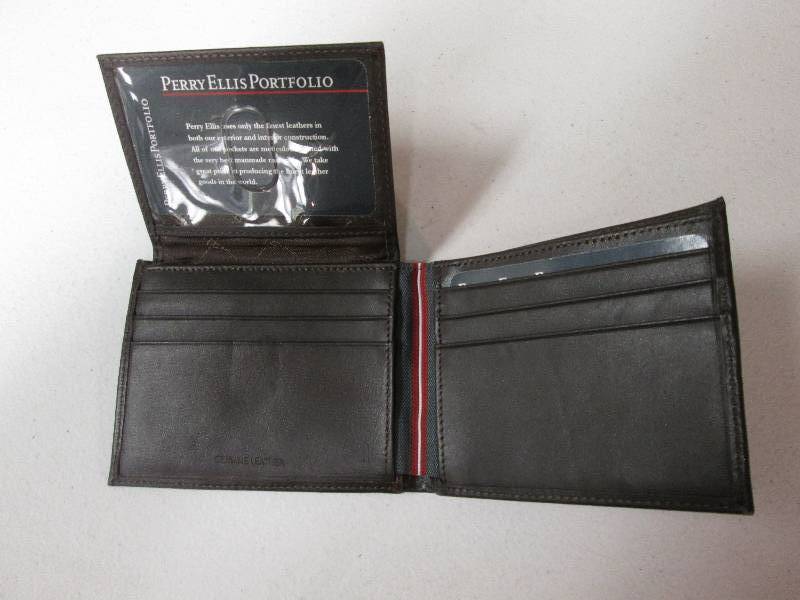 lot 31 image: Perry Ellis Brown bi-fold leather w...