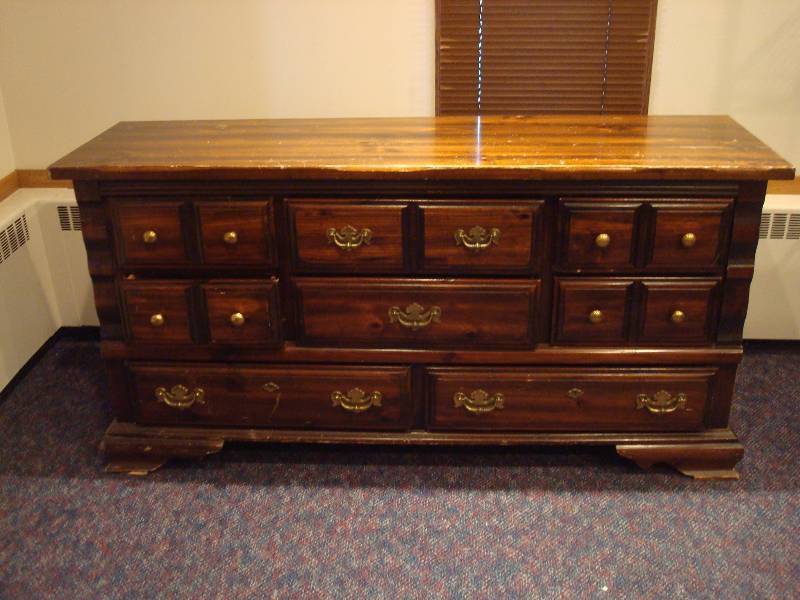 lot 18 image: Long Solid Wood Dresser. Has Wear And Needs R...