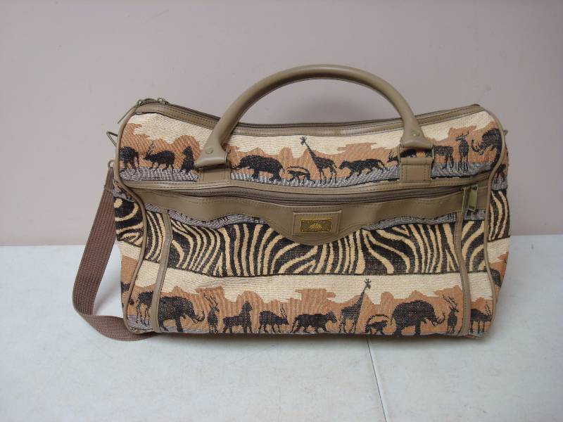 lot 125 image: Animal Print Travel Bag...