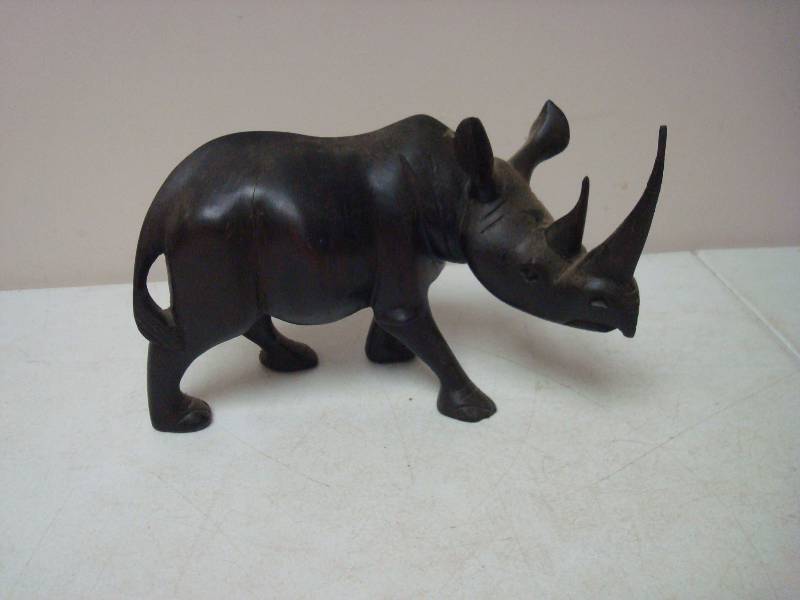 lot 135 image: Carved Wood Rhino, Broke Horn, Taped...