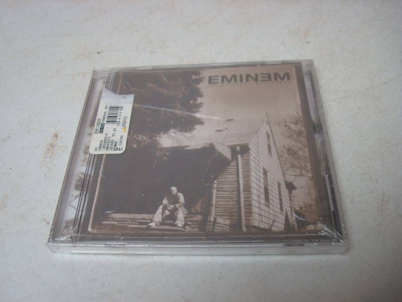 lot 154 image: New Sealed Eminem CD...
