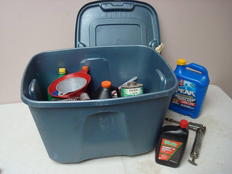 lot 184 image: Bin With Some Car Fluids...