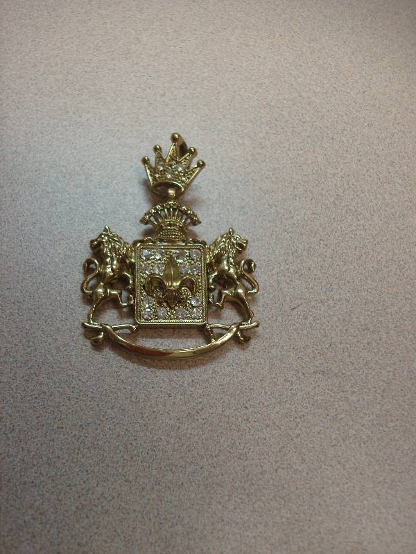 lot 200 image: Gold Toned Jewelry Medallion ...