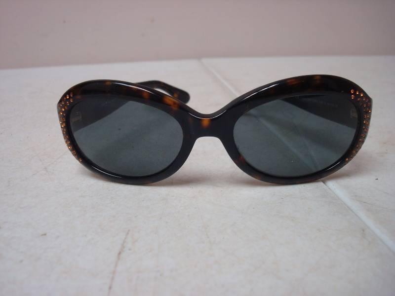 lot 201 image: Pair Of Juicy Sunglasses...