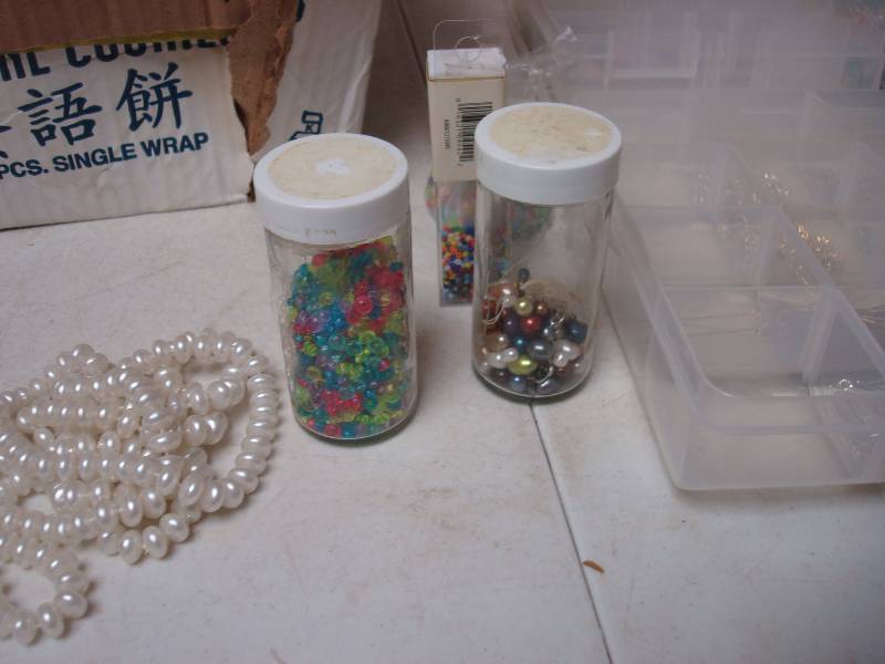 lot 210 image: Lot Of Craft Beads, Clamps, And Cases...