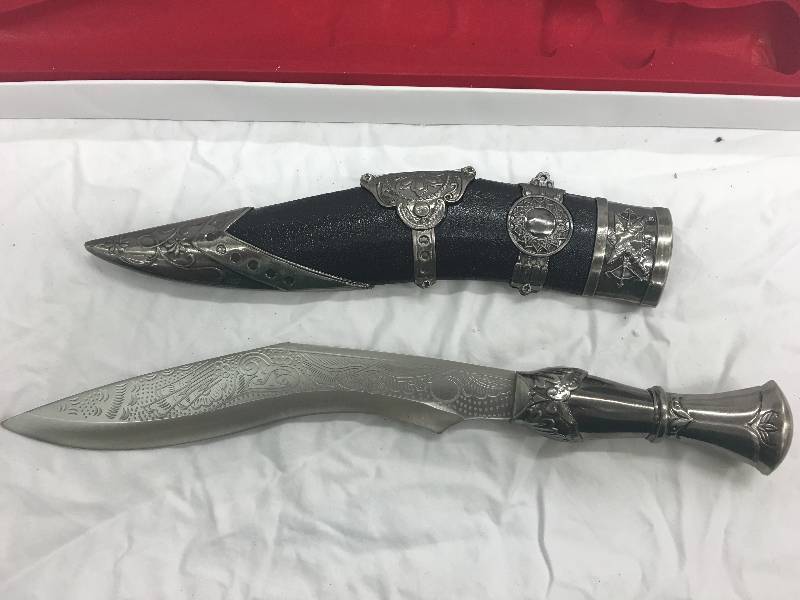curved knife with sheath