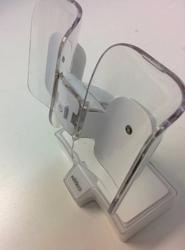 lot 20 image: Nyko Charge-Base IC Induction Charger For Wii, Base and AC Only