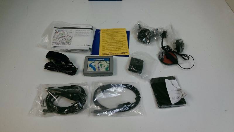 lot 25 image: Gently Used Garmin Nuvi 370 GPS Unit Bundle