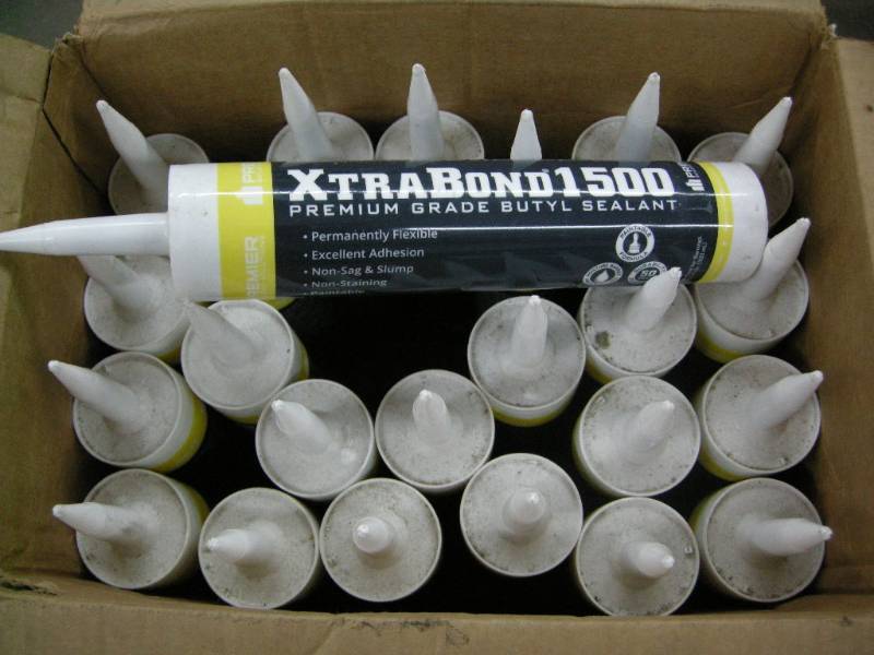 lot 107 image: Case Xtra Bond 1500 Sealant